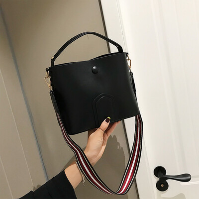 

Advanced foreign gas bag chic simple fashion bucket bag new 2019 wide shoulder belt woman bag single shoulder oblique satchel bag