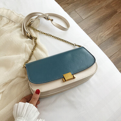 

Hong Kong style retro womens bag Korean version of the wild lock single back Messenger bag fashion simple chain saddle