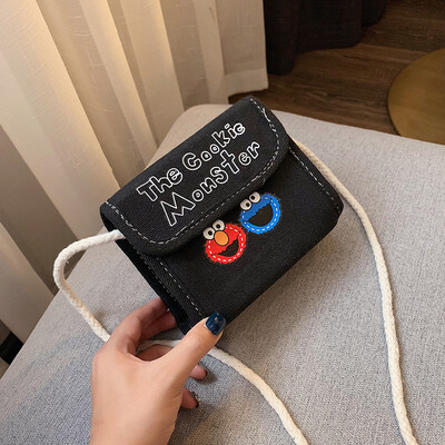 

2019 new casual fashion letters Sesame Street canvas bag female cute cartoon wild shoulder slung small square bag