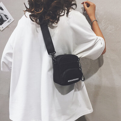 

Cloth bag female 2019 new Korean version of the wild student mini shoulder Messenger bag simple casual wide shoulder strap canvas bag