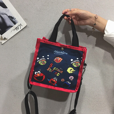 

Cloth bag handbag female 2019 new casual wild cartoon bag Korean version of the broadband canvas shoulder Messenger bag tide