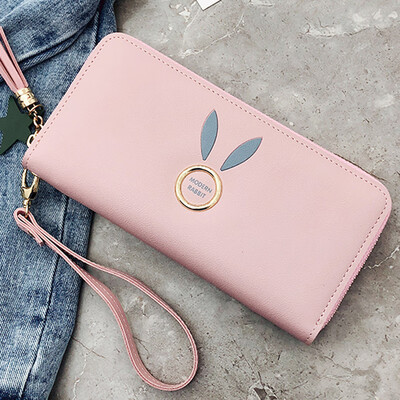 

Women holding wallets 2019 new Korean solid color zipper change clip wrist phone bag
