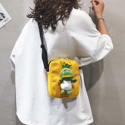

Cartoon funny small bag female Korean version of the wild cute ugly dinosaur shoulder shoulder Messenger bag foreign girl canvas bag