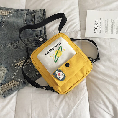 

Fashion temperament color crossbody bag chic versatile shoulder bag female 2019 new cartoon cute planet canvas bag