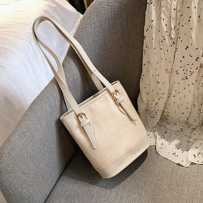 

2019 new simple contrast color shoulder bag casual fashion temperament Messenger bag small fairy wild woven bucket bag