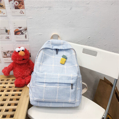 

Ins schoolbag female Korean version of high school students backpack ancient feeling girl 100 campus plaid double shoulder bag