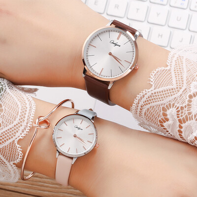 

Business with a couple watch quartz watch ultra-thin waterproof student men&women on the table