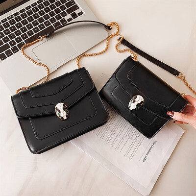 

Qiao Bani 2019 new European&American style fashion simple solid color star with the same paragraph chain flip shoulder diagonal female bag