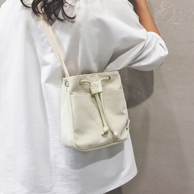 

Net red bucket small bag female 2019 new wave Korean version of the ocean shoulder bag texture fashion canvas slung small square bag