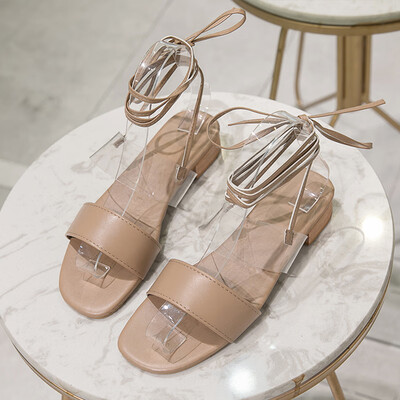

Sandals women wear Korean version of open-toed cross-tie Roman shoes flat-bottomed simple beach sandals tide