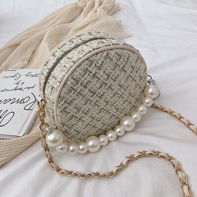 

Korean version of the small bag 2019 new fashion pearl hand bag small round bag one shoulder bag