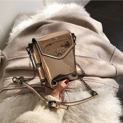 

Ins super fire small bag female 2019 new fashion patent leather rivet shoulder mobile phone bag Korean version of the wild Messenger bag