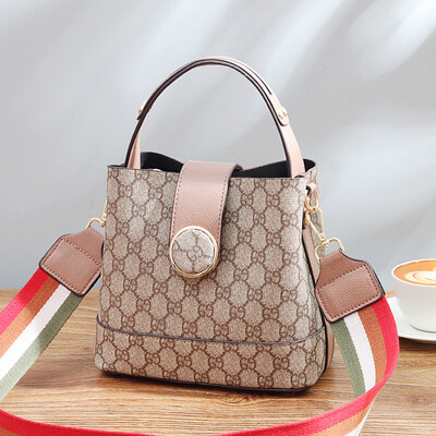 

Small bag female on new leisure bucket bag temperament wild wide shoulder strap Messenger bag simple versatile bag