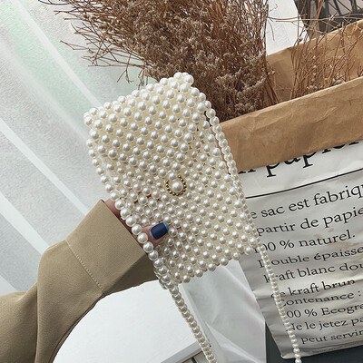

Qiao Bani 2019 new Korean Bohemian fashion handmade pearls hand strap shoulder diagonal trend handbags