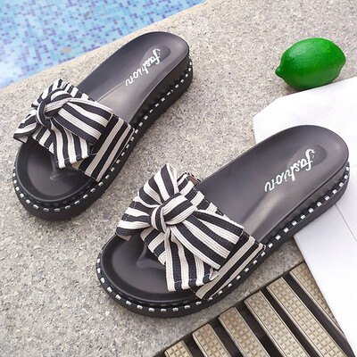 

Cool slippers women outside summer wear ingress fashion hundred to drag Korean version of the student flat-bottomed bow slippers