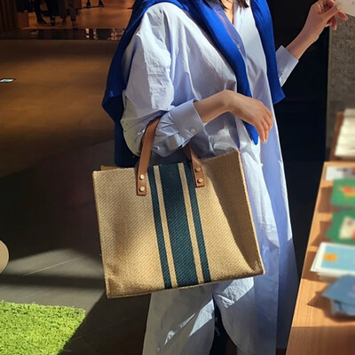 

Striped canvas handbag 2019 new shoulder bag Korean version of the tide multi-function large capacity commuter package