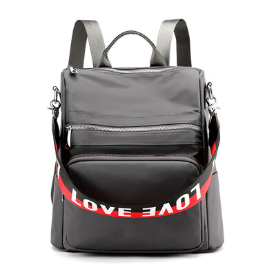 

The Korean version of the double shoulder bag is popular with students wrapped in nylon Oxford cloth small backpack canvas nylon
