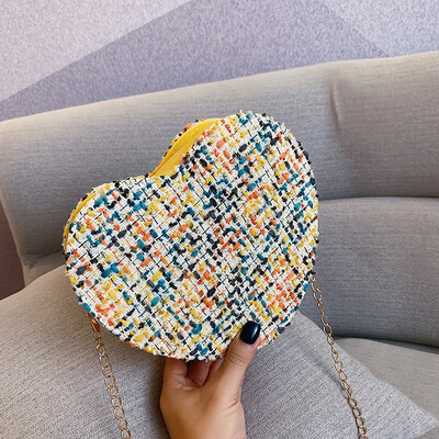 

Sen temperament chain Messenger bag fashion wild personality heart-shaped bag female 2019 new simple contrast color woven bag