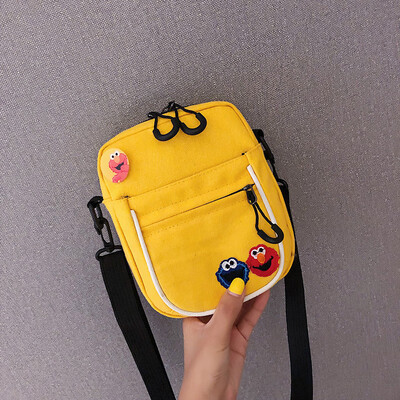 

2019 new casual fashion ugly sesame street canvas bag female cute cartoon simple versatile shoulder Messenger bag