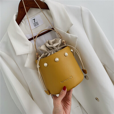 

Summer Korean version 100 bucket bag girl new 2019ins mini hand chain single shoulder slant bag tide