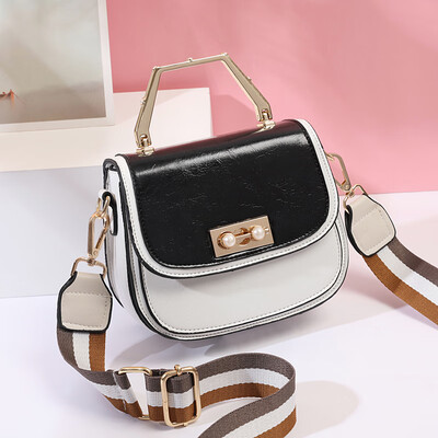 

Summer womens new Korean version of the fashion trendy small round bag impact color oblique satchel