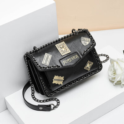 

Retro spring&summer tide woman hand-held retro badge 100 lap rivets chain single shoulder oblique satchel bag