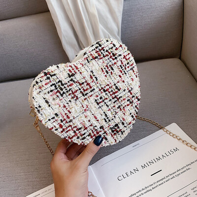 

Sen temperament chain Messenger bag fashion wild personality heart-shaped bag female 2019 new simple contrast color woven bag
