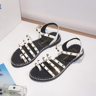 

2019 rivet new Roman Korean student sandals children buckle beach shoes flat number with Korean female summer
