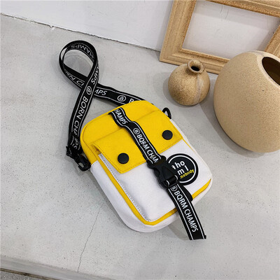 

Canvas bag female new Korean fashion wild shoulder messenger bag hit color small square bag tide