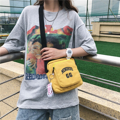 

Small bag canvas bag womens shoulder Messenger bag college student chic Joker Korean version of ancient feeling girl ins Sen