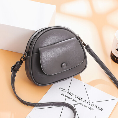 

Korean version of the simple ins wind student small round bag shoulder diagonal package solid color small bag female