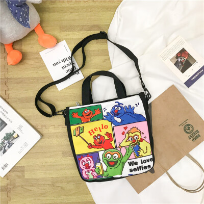 

Cartoon bag female new Korean version of the large-capacity portable student bag hit color single shoulder Messenger bag