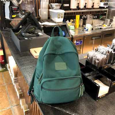 

Ins bag girl Korean version of high school students simple Sen tied the ancient sense of girls light backpack Japanese double sho