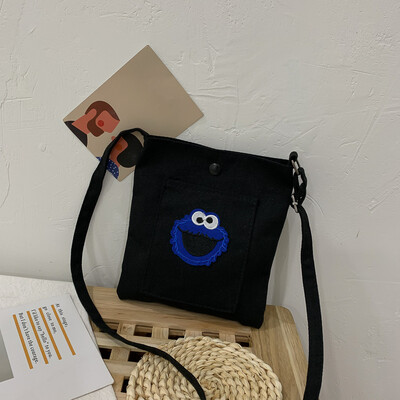 

2019 new casual fashion ugly sesame street canvas bag female cute cartoon simple versatile shoulder Messenger bag