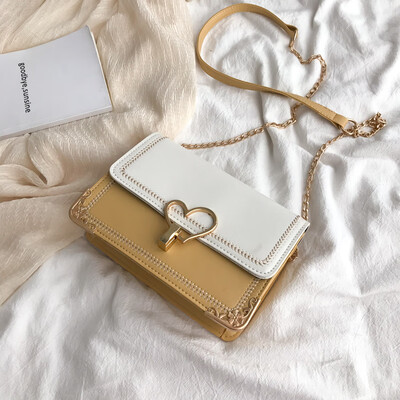 

Chic wild fashion temperament contrast color shoulder bag female 2019 new embroidered line peach heart-shaped lock buckle Messenger bag