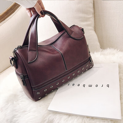 

Chic bag female 2019 new handbag Korean fashion retro rivets versatile shoulder slung Boston bag