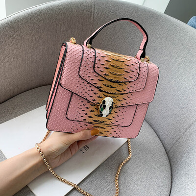 

Qiao Bani 2019 new European&American style fashion snake pattern transition color BV snake head flip cover shoulder shoulder diagonal handbag
