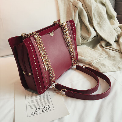 

Hong Kong style small bag female 2019 summer new wave personality rivet tote bag Korean version of the wild shoulder slung female