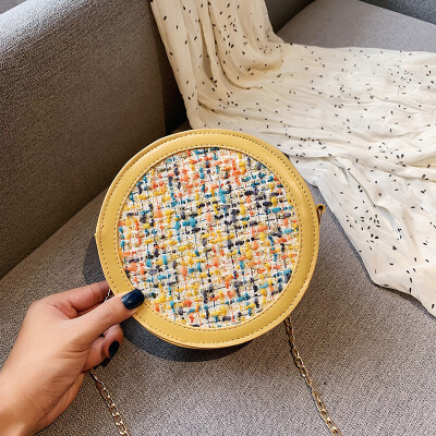 

Fashion wild personality small round bag 2019 new Sen temperament chain Messenger bag female simple contrast color woven bag