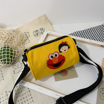 

Casual fashion ugly sesame street canvas cylinder bag female 2019 new cartoon simple versatile shoulder Messenger bag