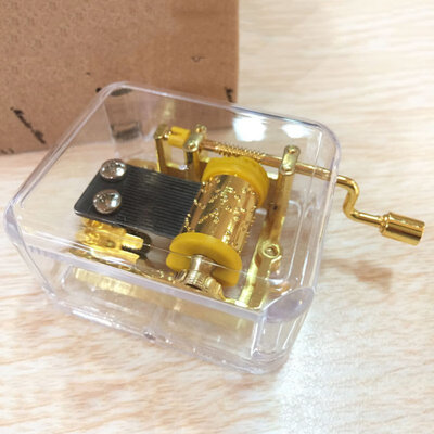 

Exquisite Clear Acrylic Square Gold Hand Cranked Gurdy 18 Note Music Box Play Castle in the Sky