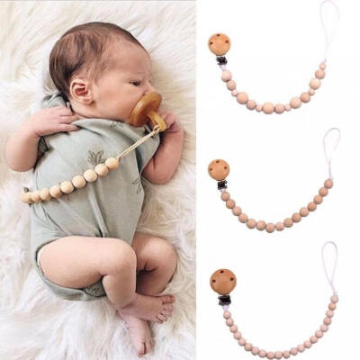 

Cute Babys Teething Soother Pacifier Holder Clip Wooden Beads Nipple Strap Chain