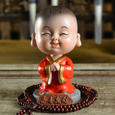 

Kang car treasure car ornaments shaking head Maitreya Buddha cartoon little monk pendant decoration car interior decoration for a lifetime