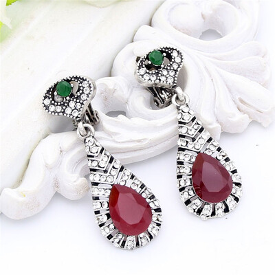 

Exhibition New Style Turkish Women Long Clip Earring Antique Silver Color Resin Symmetric Hollow Leaves Arab Earring Jewelry