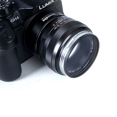 

commlite cm-ef-mft объектив адаптер для Canon EOS EF / ef-s микро - четыре трети (ее) камеры; поддерживает электронные авто отверстие 3