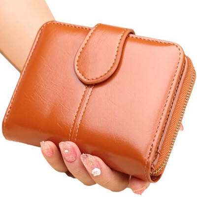 

Clutch female brand Bag wallet women zipper design mobile phone bags japanned PU lOil wax eather folder clutch Short paragraph