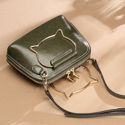 

Nalandu Nalandu handbags small bag ladies shoulder cat handbag Korean version of the slung shell bag trend mobile phone bag DB91820-A black