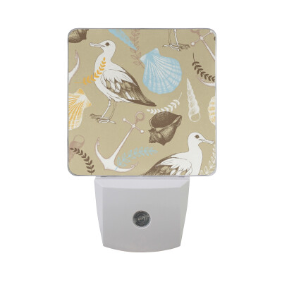 

ALAZA LED Night Light With Smart Dusk To Dawn SensorBackground With Dooodle Starfishes Porthole Plug In Night Light