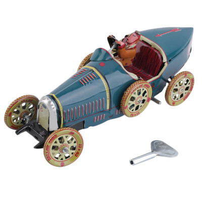 

Vintage Metal Tin Sports Car with Driver Clockwork Wind Up Toy Collectible