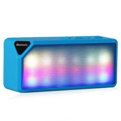

X3S Mini Multi-Color Flash LED Light Wireless Speaker with Built-in Microphone Support USB AUX FM Radio TF Card